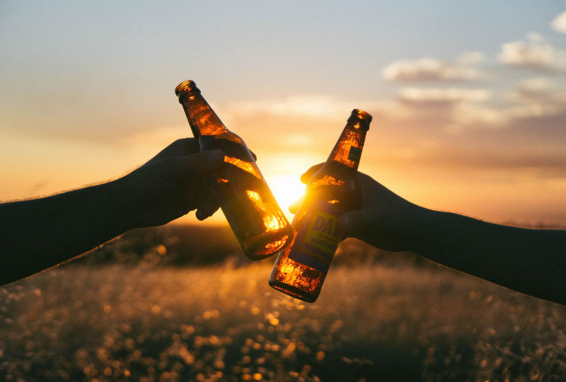 Enjoying a beer at sunset